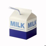Milk carton with straw on white